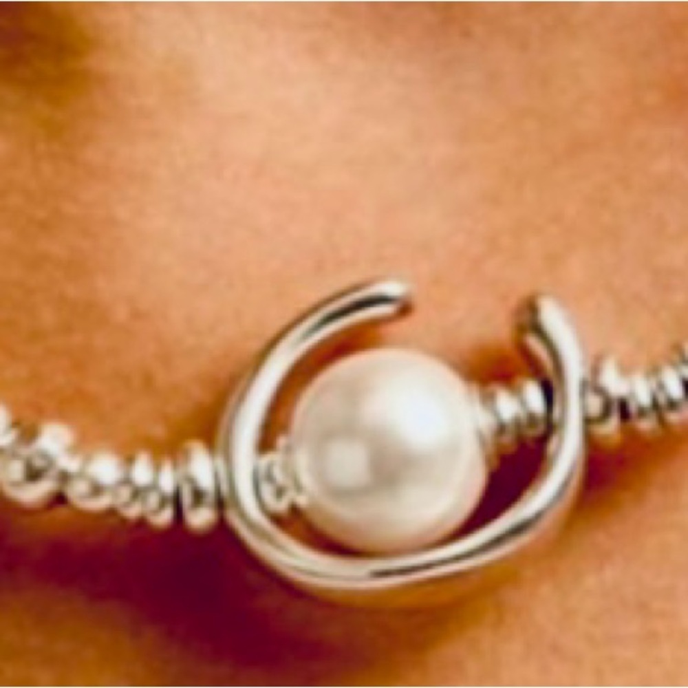 Uno de 50 necklace with Horseshoe enclosed pearl